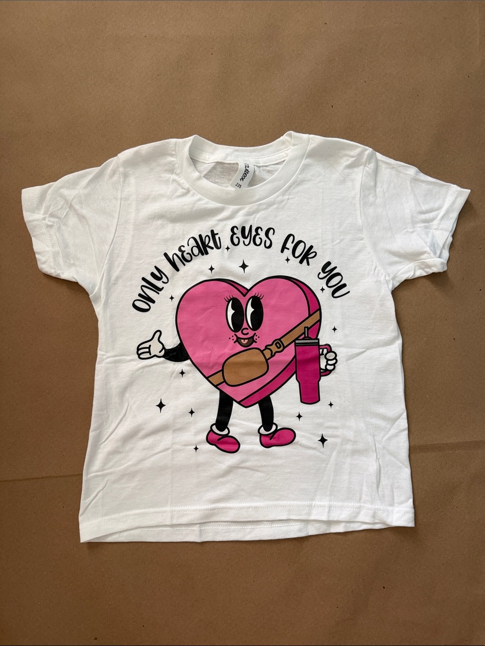 White Kids Tee with Pink Heart Character Graphic “only heart eyes for you”